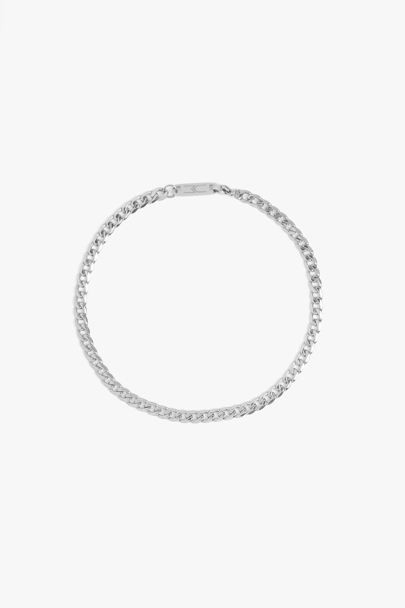 Marrin Costello Jewelry Callie Anklet small cuban link chain anklet with lobster clasp closure. Waterproof, sustainable, hypoallergenic. Polished stainless steel.