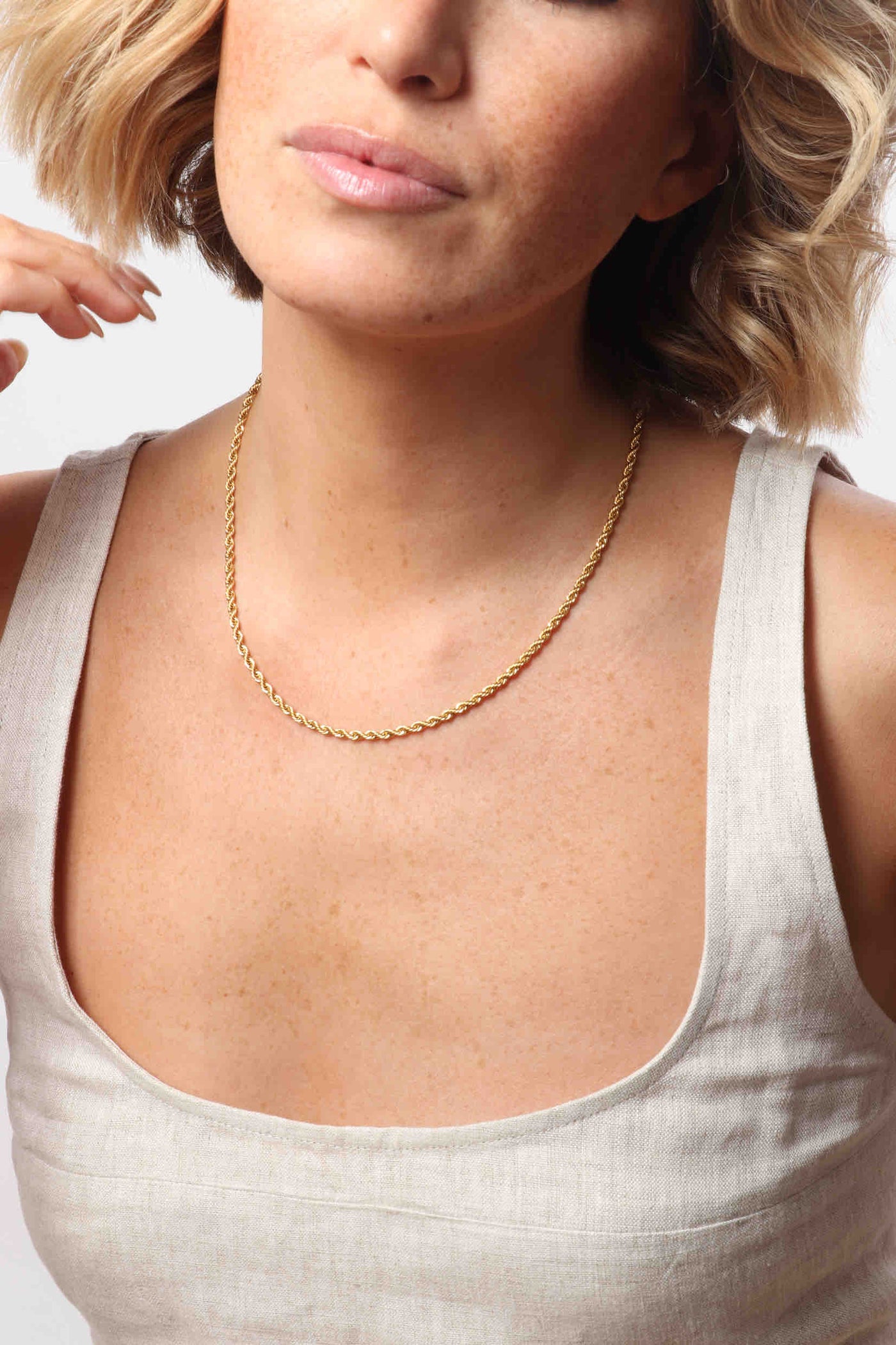 Marrin Costello wearing Marrin Costello Jewelry Helix 5mm Chain thick rope twist chain with lobster clasp closure and extender. Waterproof, sustainable, hypoallergenic. 14k gold plated stainless steel.