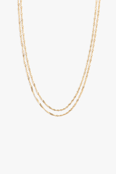 Marrin Costello Jewelry Helix Layers with thin dainty helix chains layered in a two in one necklace with lobster clasp closure and extender. Waterproof, sustainable, hypoallergenic. 14k gold plated stainless steel.