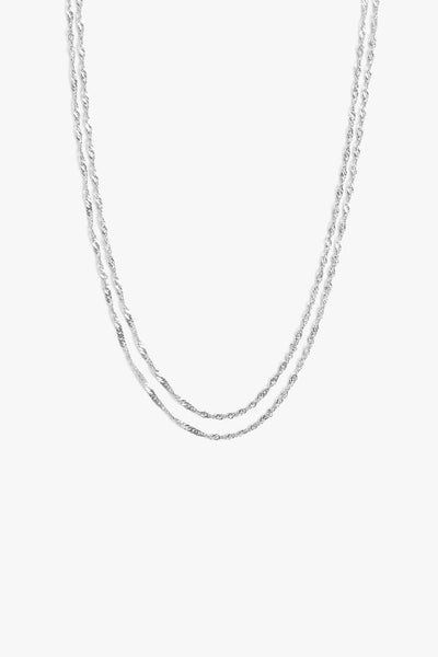 Marrin Costello Jewelry Helix Layers with thin dainty helix chains layered in a two in one necklace with lobster clasp closure and extender. Waterproof, sustainable, hypoallergenic. Polished stainless steel.