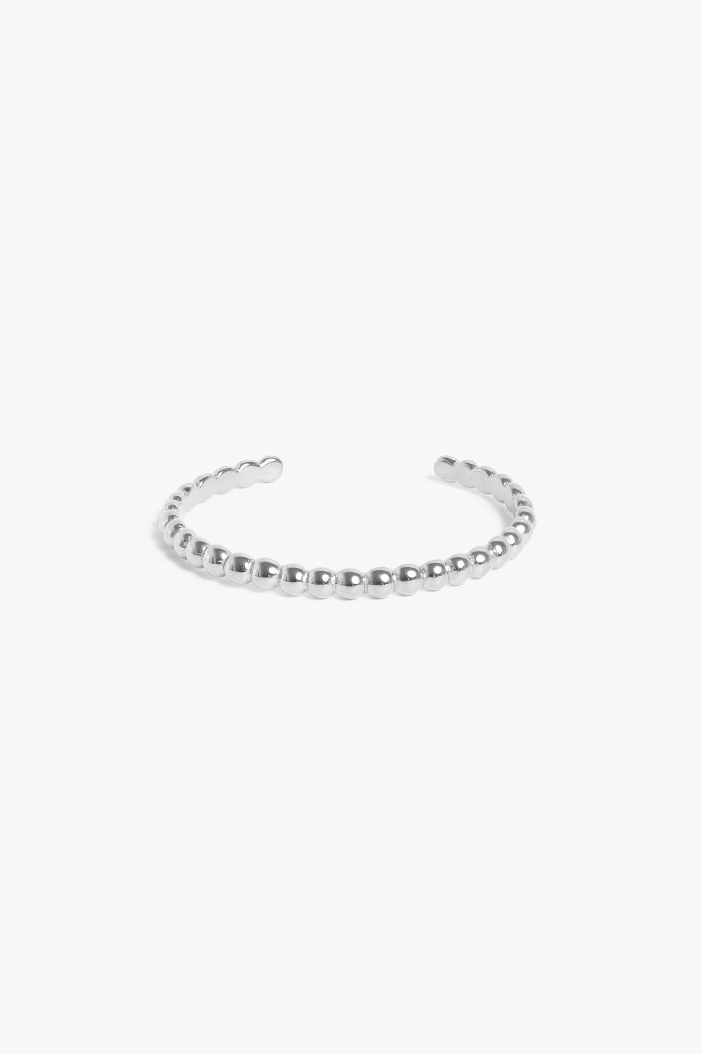 Marrin Costello Jewelry Crown XL Cuff dot adjustable bracelet. Waterproof, sustainable, hypoallergenic. Polished stainless steel.