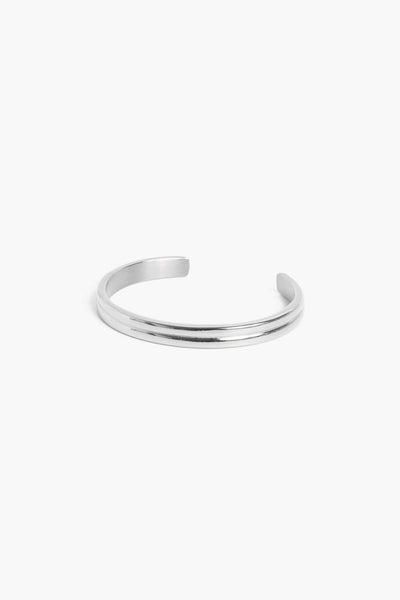 Marrin Costello Jewelry Petra Cuff double band adjustable bracelet with cuff opening. Waterproof, sustainable, hypoallergenic. Polished stainless steel.