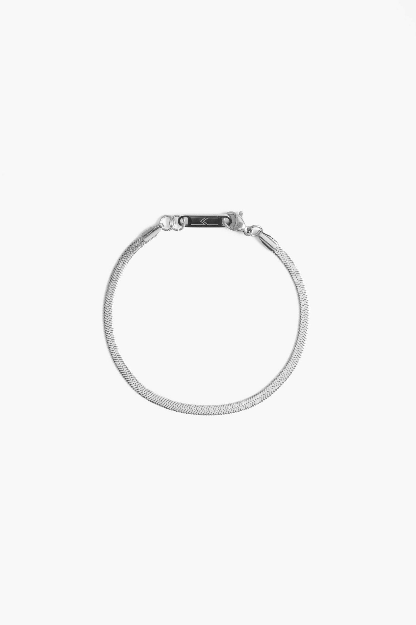 Marrin Costello Jewelry 3mm thick herringbone snake chain bracelet with lobster clasp closure. Waterproof, sustainable, hypoallergenic. Polished stainless steel.