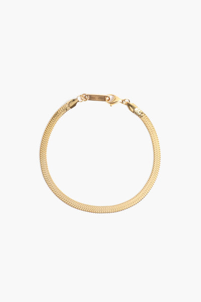 Marrin Costello Jewelry 5mm thick herringbone snake chain anklet with lobster clasp closure. Waterproof, sustainable, hypoallergenic. 14k gold plated stainless steel.