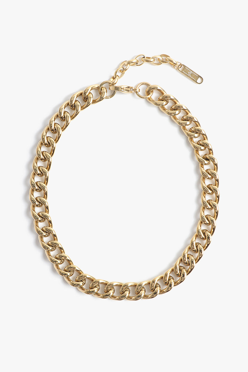 Marrin Costello Jewelry Queens Choker chunky statement cuban link chain necklace with lobster clasp closure and extender. Waterproof, sustainable, hypoallergenic. 14k gold plated stainless steel.
